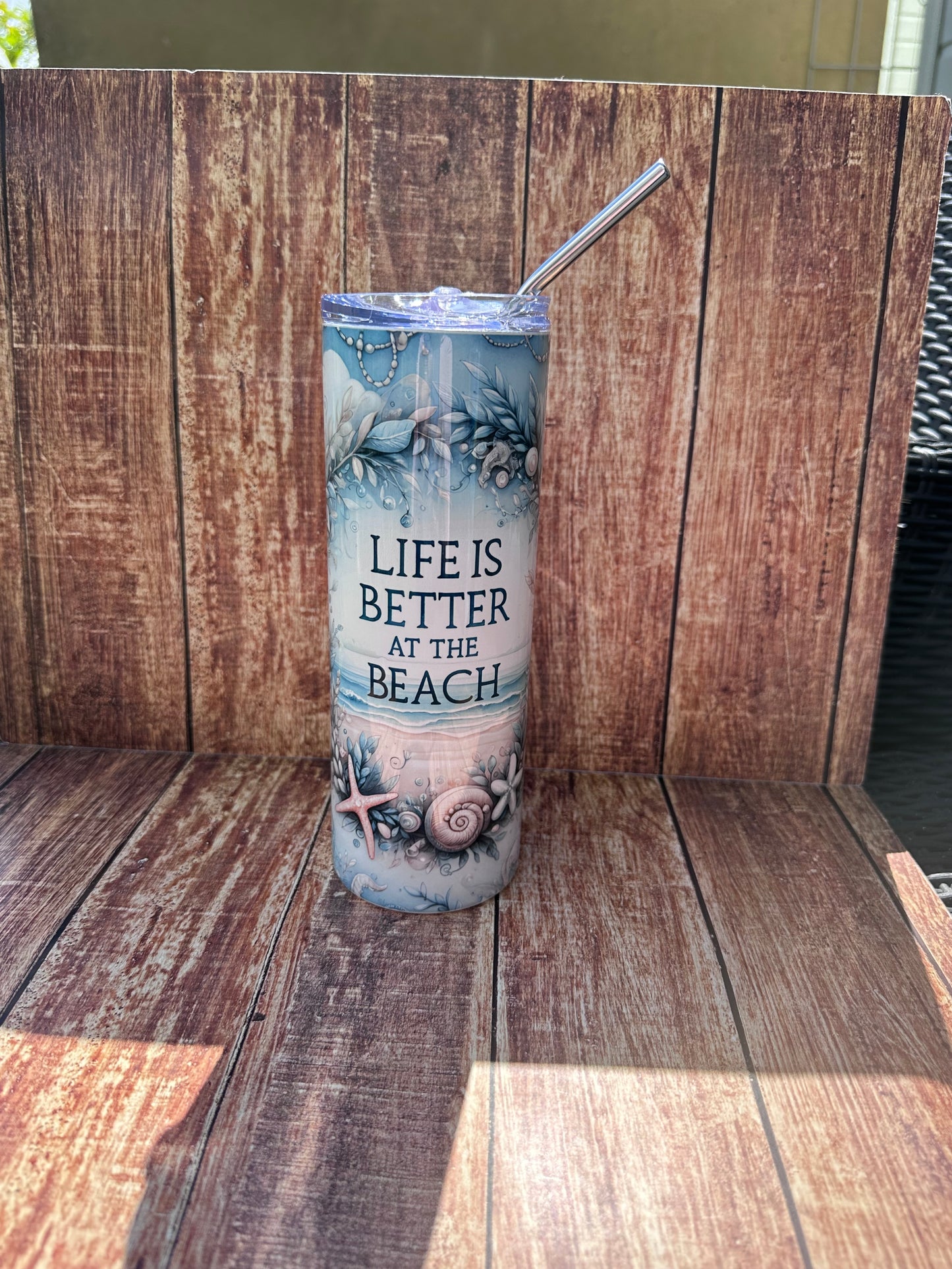 Life is better by the beach design tumbler.