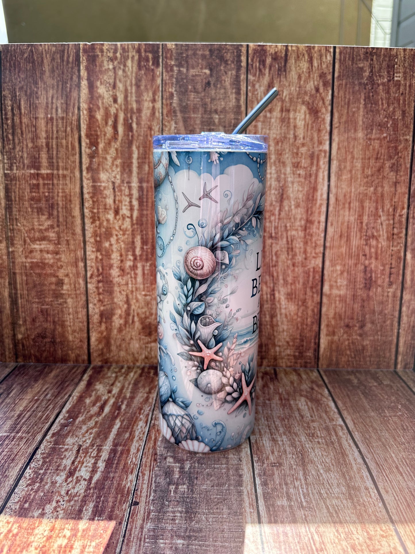 Life is better by the beach design tumbler.