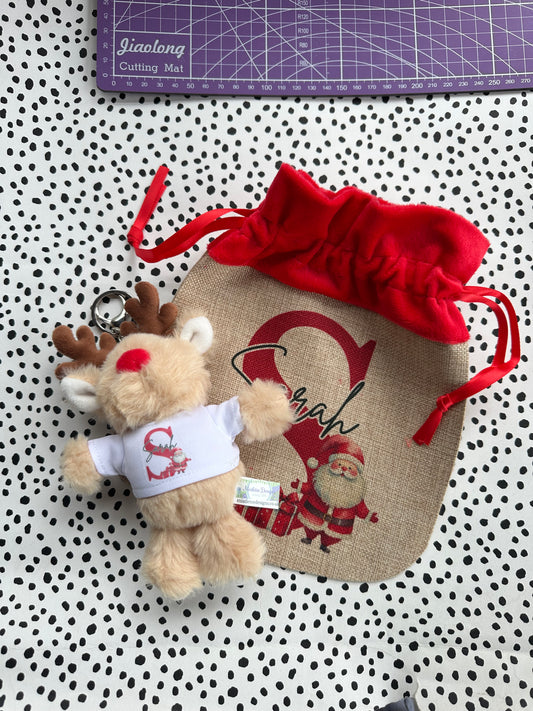 Christmas reindeer keyrings and gift bag with red velvet drawstring bag. Personalised with your name