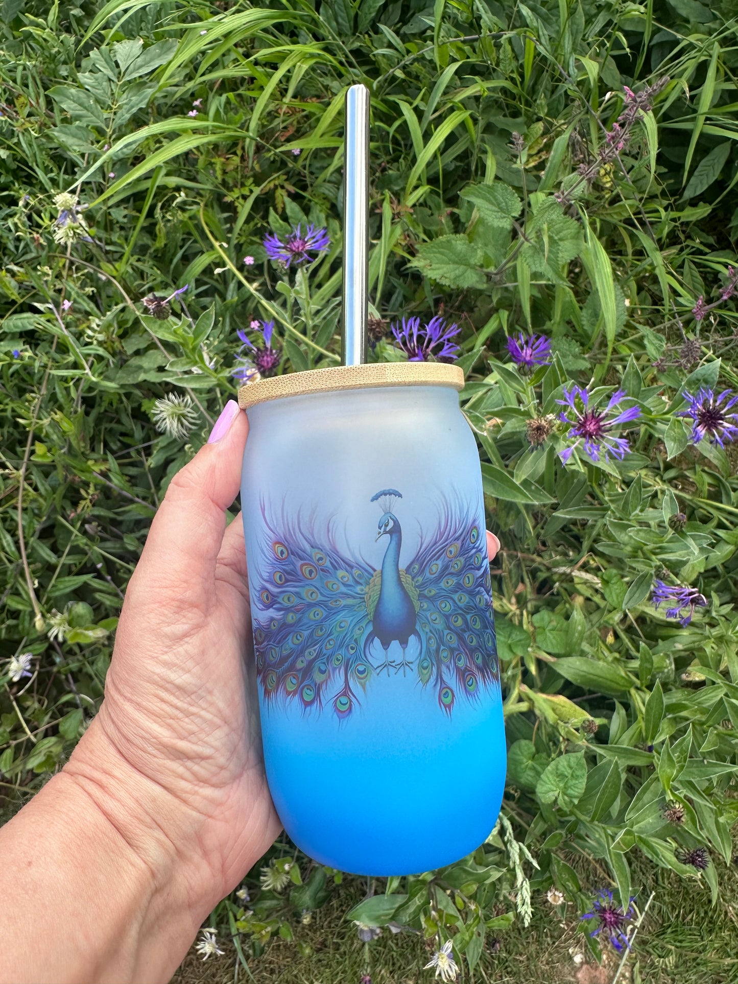 Blue ombré glass tumbler with peacock design