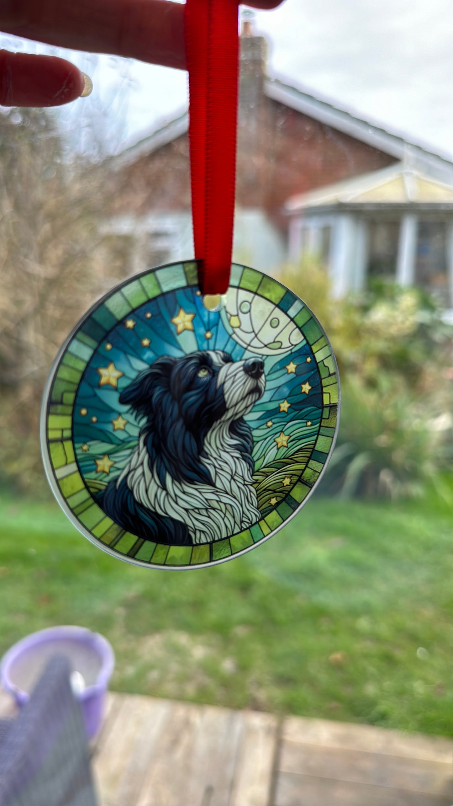 Glass hanging decoration with black and white collie dog, sheep dog design