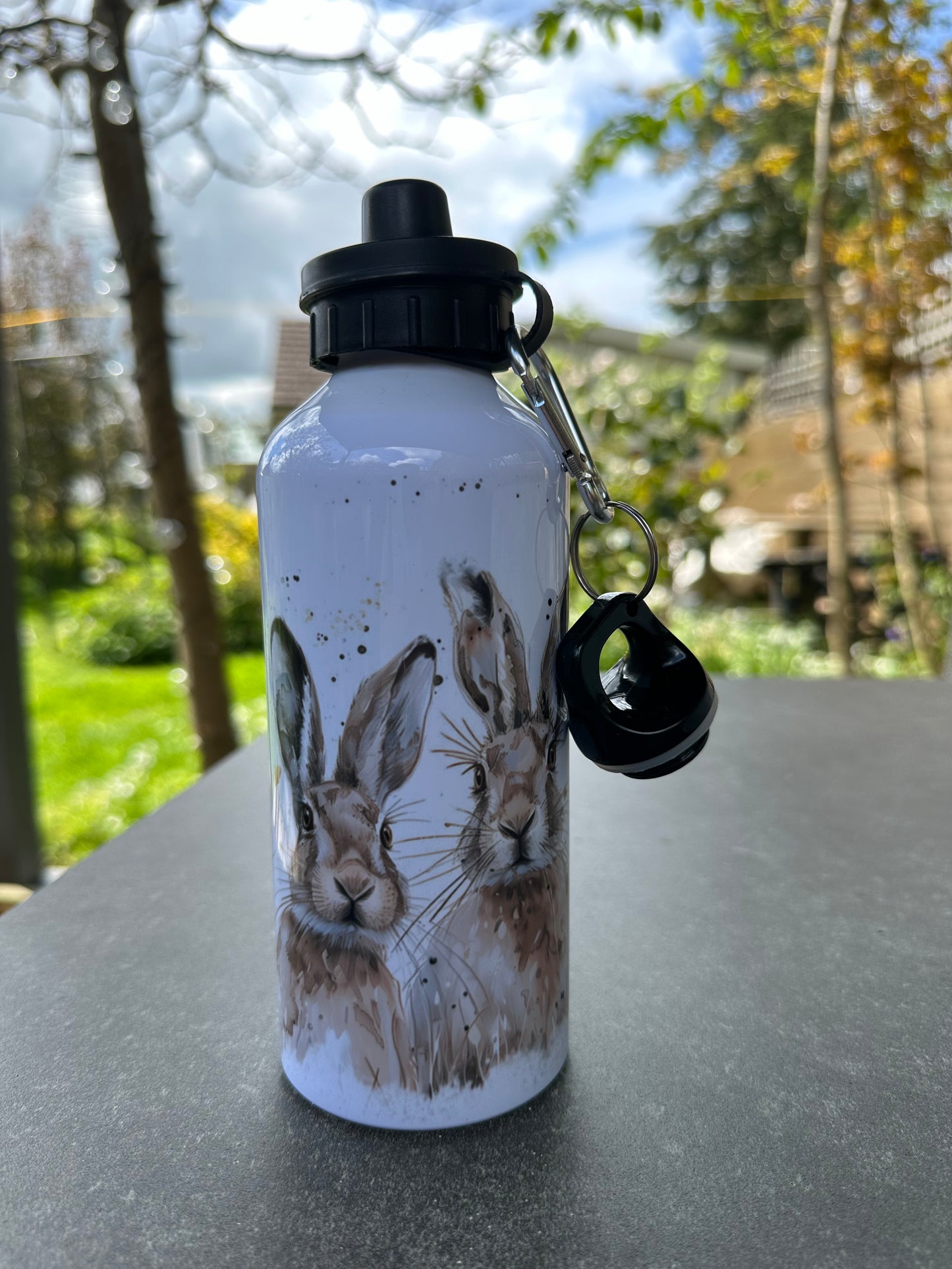 Hare design water bottle with two lids