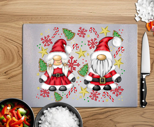 Mr and Mrs Claus A4 glass chopping board