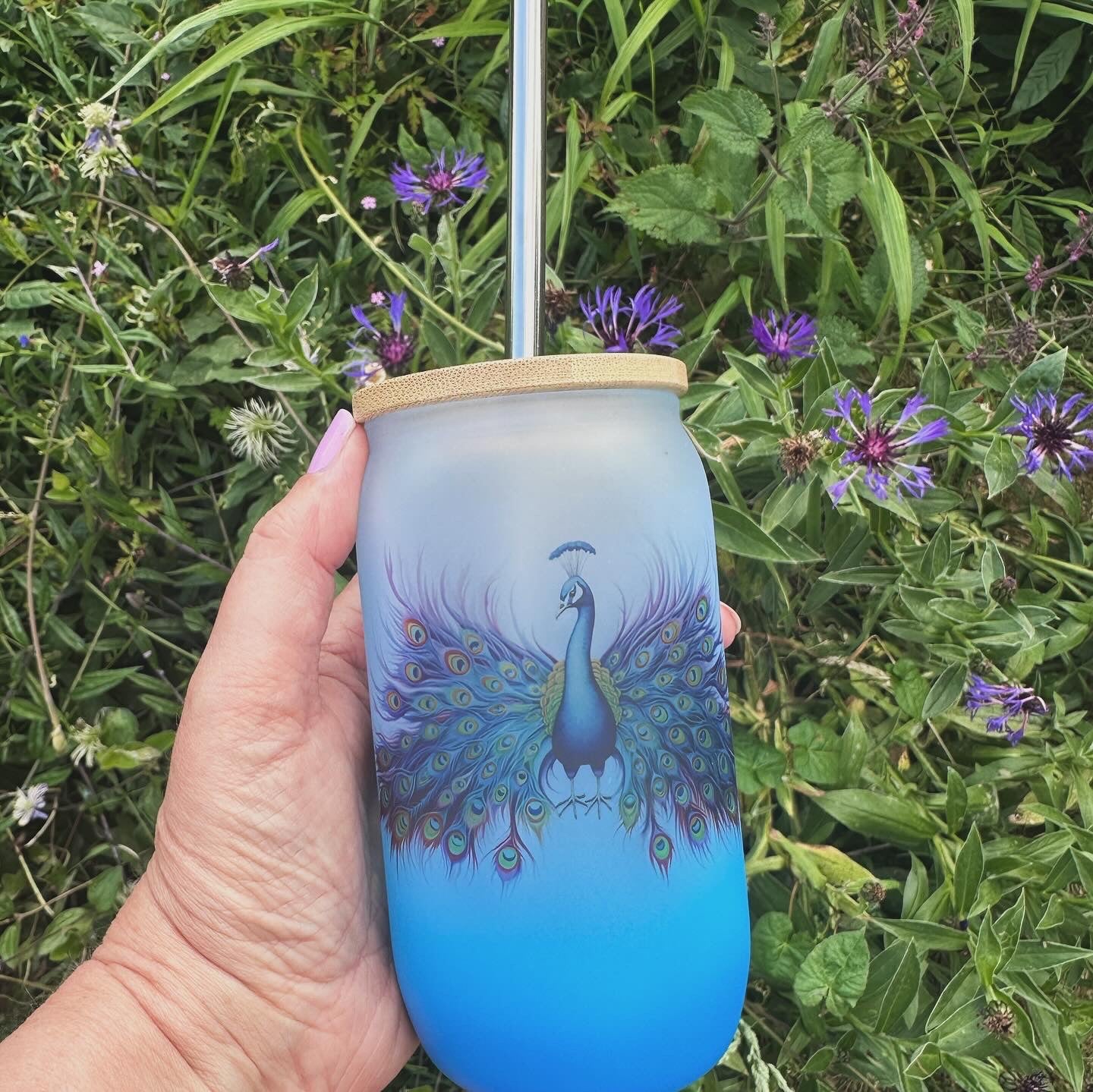 Blue ombré glass tumbler with peacock design