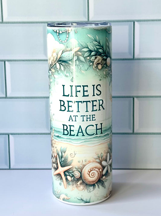 Life is better by the beach design tumbler.