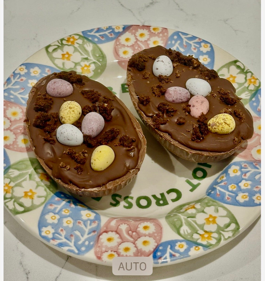 Half a chocolate Easter egg filled with cookies and cream filling or salted caramel.